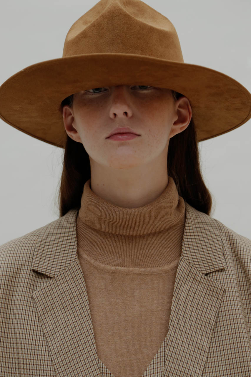 Accents — Suit UNQ 21 Turtleneck Sophie Morton Hat James Martin Milner